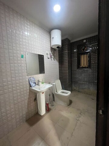 Bathroom in 3 BHK Builder Floor at Chattarpur – for Rent