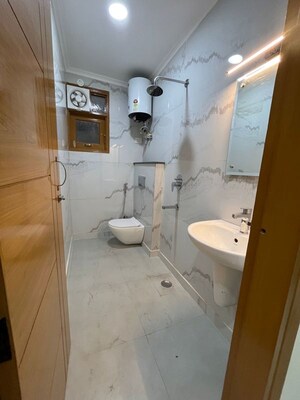 Bathroom in 2 BHK Builder Floor at Chattarpur – for Rent