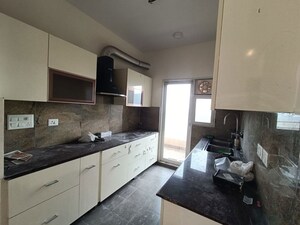 Kitchen in 3 BHK Apartment at Elite Golf Green, Sector 79 – for Rent
