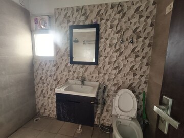 Bathroom in 3 BHK Apartment at Elite Golf Green, Sector 79 – for Rent