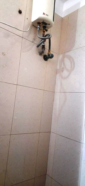 Bathroom in 2 BHK Apartment at Amey Apartments, Rambaug Colony – for Rent