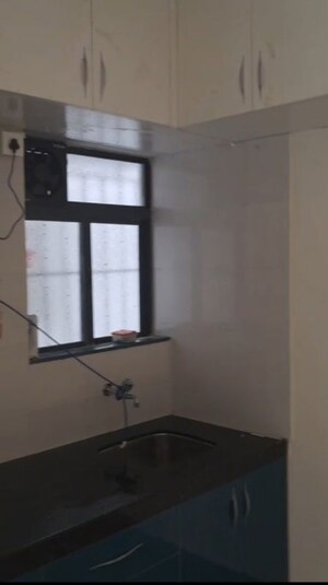 Kitchen in 2 BHK Apartment at Paranjape Broadway, Wakad – for Rent