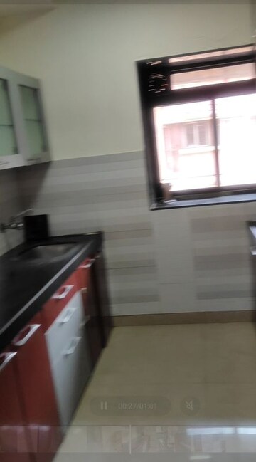 Kitchen in 2 BHK Apartment at Milind Matruchhaya, Andheri West – for Sale