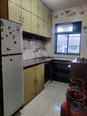 Kitchen in 1 BHK Apartment at Royal Palms, Goregaon East – for Rent
