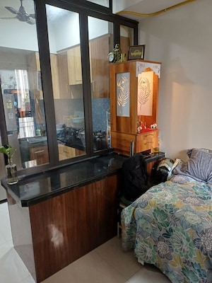 Living Room in 1 BHK Apartment at Lodha Crown Quality Homes, Majiwada – for Sale