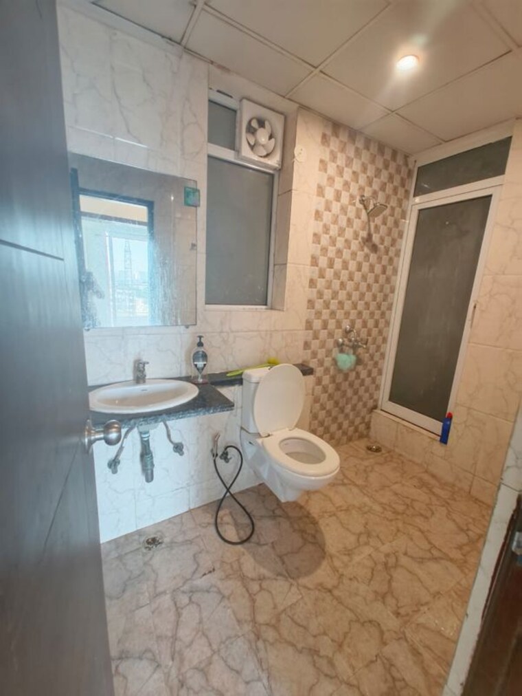 Bathroom, mahagun-mirabella-highrise 2 Bedroom 1380 Sq.Ft. Apartment In Sector 79 Noida 10117086