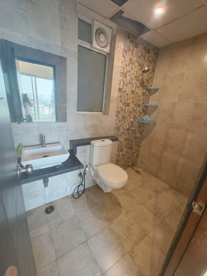 Bathroom in 2 BHK Apartment at Mahagun Mirabella Highrise, Sector 79 – for Rent
