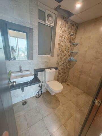 Bathroom in 2 BHK Apartment at Mahagun Mirabella Highrise, Sector 79 – for Rent