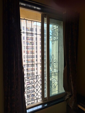 Bedroom in 2 BHK Apartment at Larkins Pride Palms, Kolshet Road – for Sale