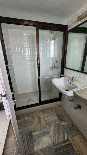 Bathroom in 1 BHK Apartment at Goregaon West View CHS, Goregaon West – for Rent