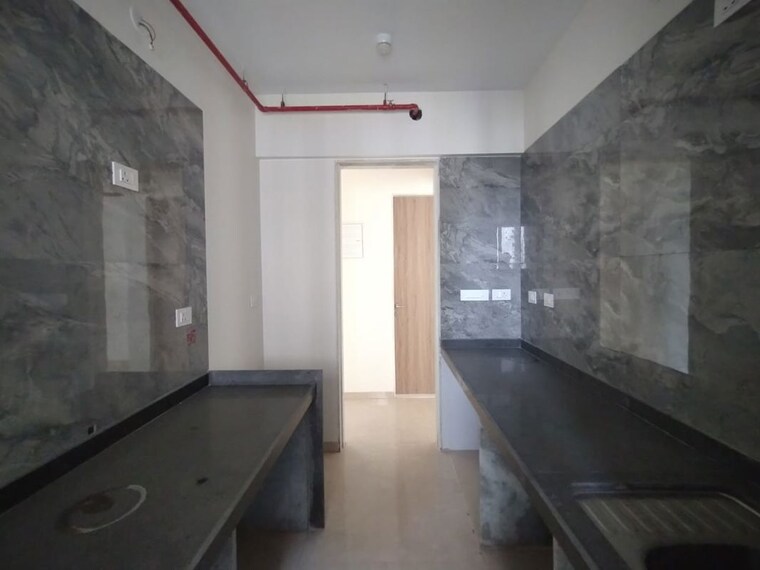 Kitchen, dosti-eastern-bay-phase-2 2 Bedroom 712 Sq.Ft. Apartment In Wadala Mumbai 10117133