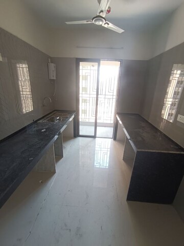 Kitchen in 2 BHK Apartment at Regency Antilia Phase V Avana, Ulhasnagar – for Sale