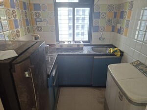 Kitchen in 1 BHK Apartment at Puranik Aarambh, Ghodbunder Road – for Rent