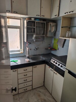 Kitchen in 1 BHK Apartment at Poornima Apartments, Colaba – for Sale