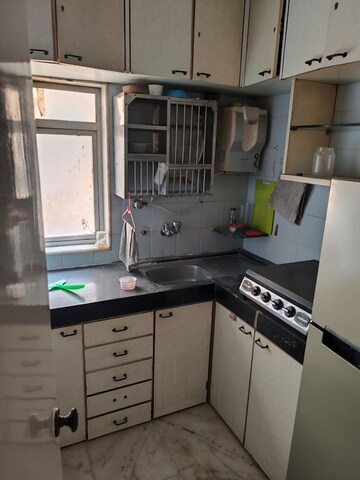 Kitchen in 1 BHK Apartment at Poornima Apartments, Colaba – for Sale
