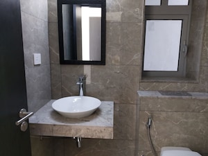 Bathroom in 3 BHK Apartment at Oberoi Realty Esquire, Goregaon East – for Rent