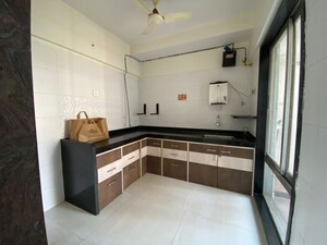 Kitchen in 2 BHK Apartment at Seawoods Sector 50 – for Rent