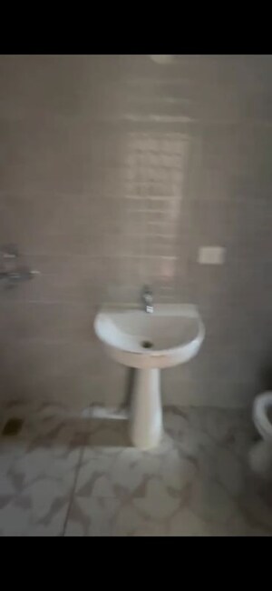 Bathroom in 2 BHK Apartment at Sector 16 Greater Noida – for Rent