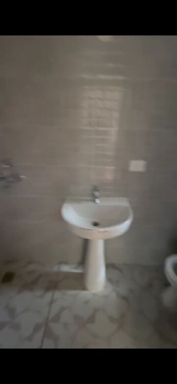 Bathroom in 2 BHK Apartment at Sector 16 Greater Noida – for Rent