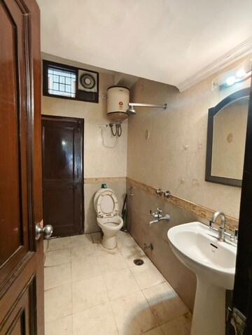 Bathroom in 3.5 BHK Apartment at Vasant Kunj – for Rent