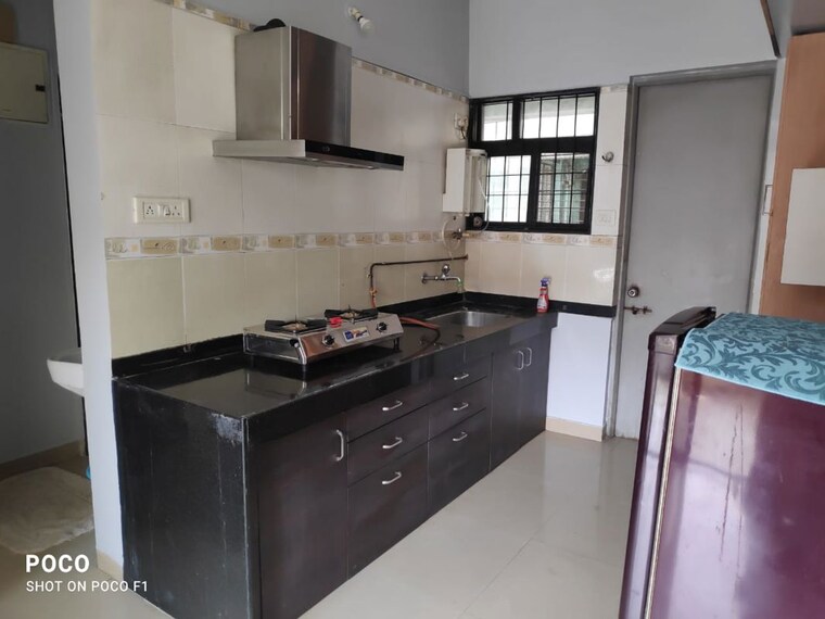 Kitchen, magarpatta city 2 Bedroom 950 Sq.Ft. Apartment In Magarpatta City Pune 10118800