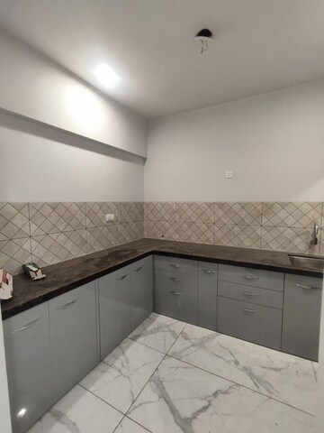 Kitchen in 3 BHK Apartment at Rahul Downtown, Punawale – for Rent