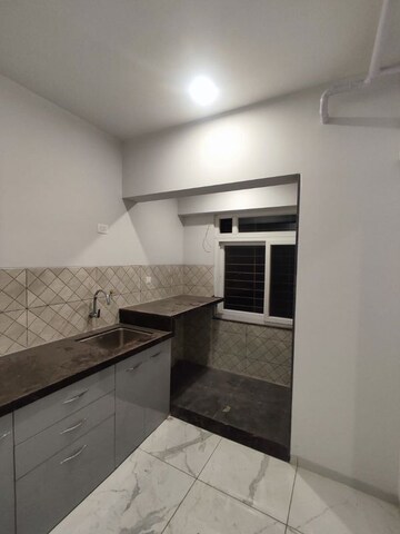 Kitchen in 3 BHK Apartment at Rahul Downtown, Punawale – for Rent