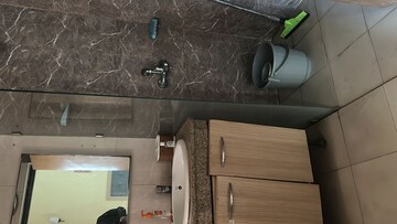 Bathroom in Studio Apartment at Nimbus The Golden Palm, Sector 168 – for Rent