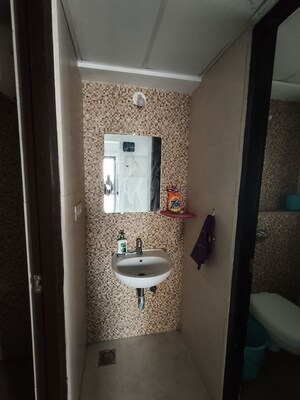 Bathroom in 1 BHK Apartment at Lodha Lakeshore Greens, Dombivli East – for Rent