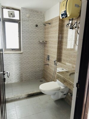 Bathroom in 1 BHK Apartment at Unitech The Residences Gurgaon, Sector 33 – for Rent