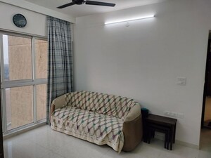 Living Room in 2 BHK Apartment at Lodha Quality Home Tower 5, Majiwada – for Rent