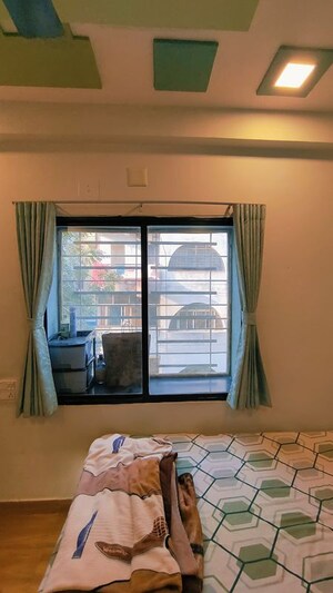 Room in 2 BHK Apartment at Satellite – for Sale
