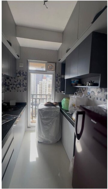Kitchen in 1 BHK Apartment at Raunak Bliss, Ghodbunder Road – for Rent