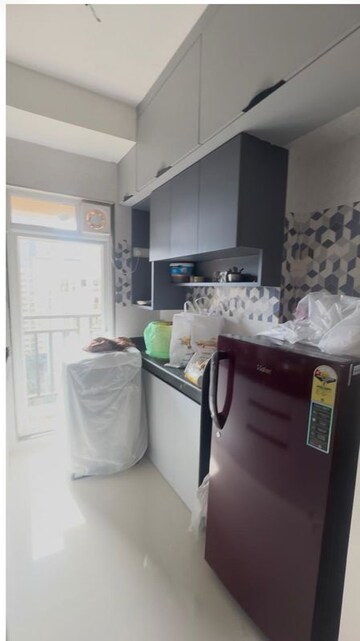 Kitchen in 1 BHK Apartment at Raunak Bliss, Ghodbunder Road – for Rent