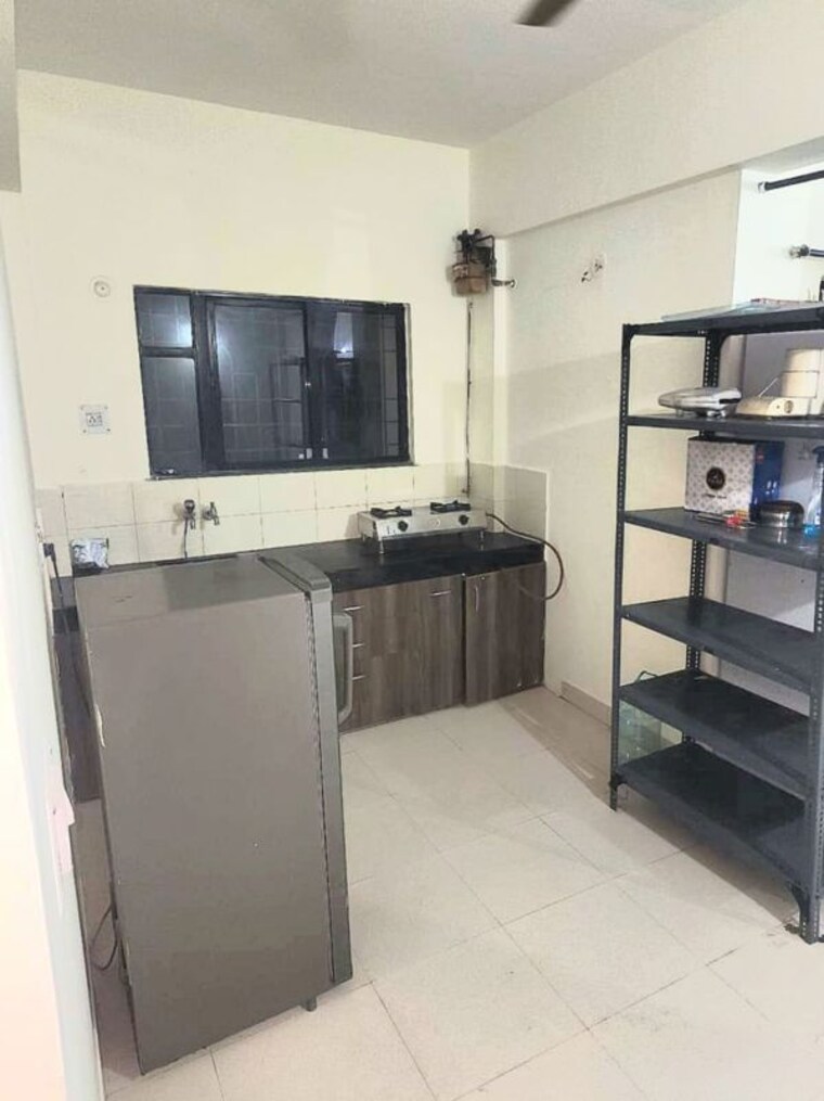 Kitchen, magarpatta city 2 Bedroom 950 Sq.Ft. Apartment In Magarpatta City Pune 10120509