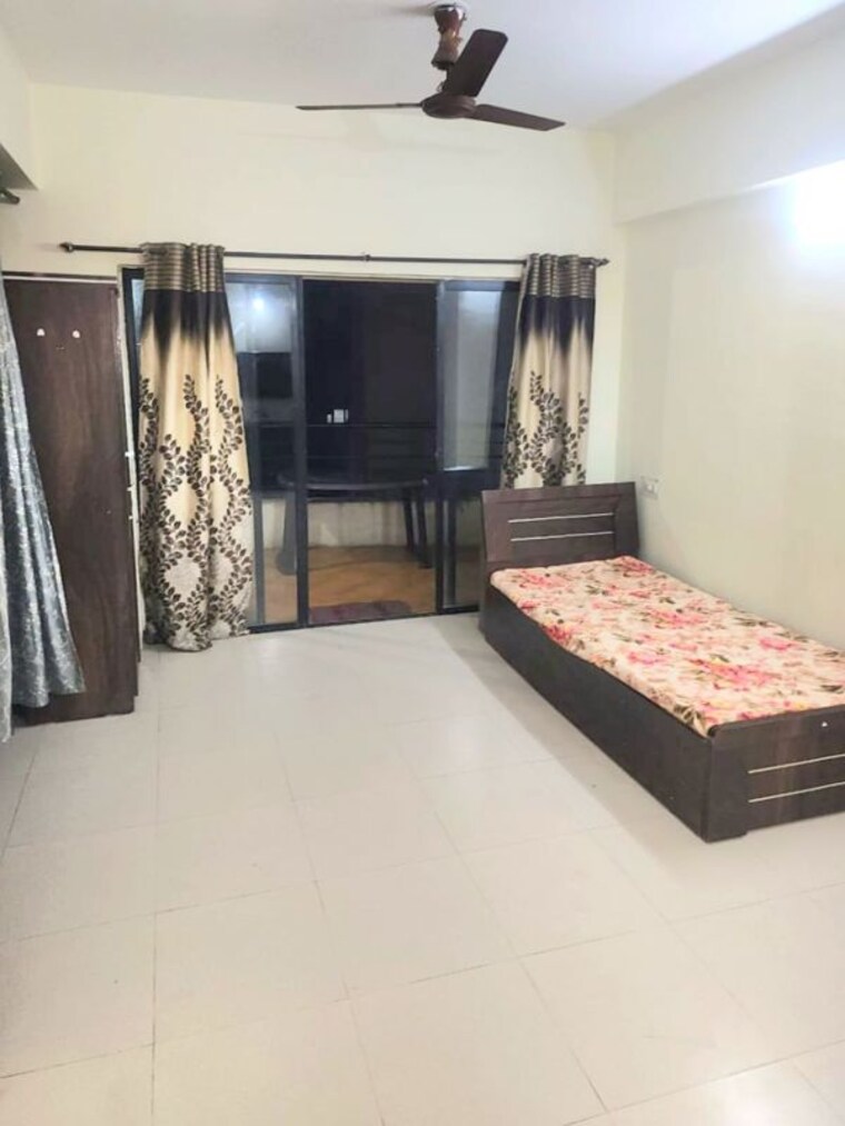 Bedroom, magarpatta city 2 Bedroom 950 Sq.Ft. Apartment In Magarpatta City Pune 10120509