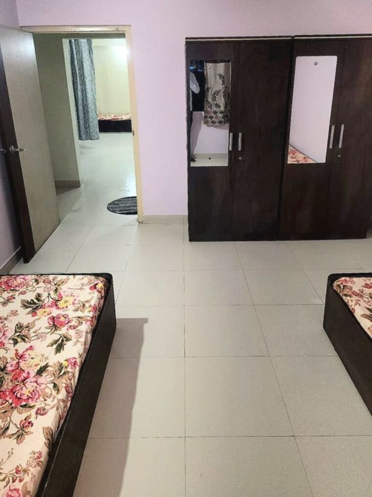 Bedroom, magarpatta city 2 Bedroom 950 Sq.Ft. Apartment In Magarpatta City Pune 10120509