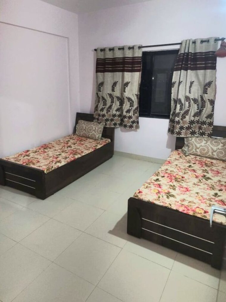 Bedroom, magarpatta city 2 Bedroom 950 Sq.Ft. Apartment In Magarpatta City Pune 10120509
