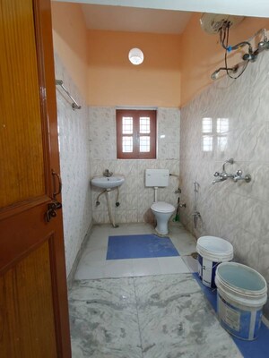 Bathroom in 1.5 BHK Builder Floor at Aman Vihar – for Rent