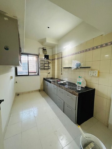 Kitchen in 2 BHK Apartment at Raheja Woods, Kalyani Nagar – for Rent