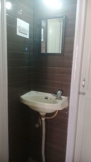 Bathroom in 1 BHK Apartment at Raunak Park, Kokanipada – for Rent