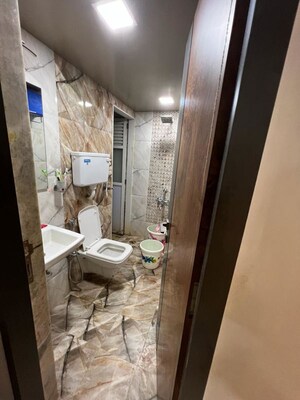 Bathroom in 2 BHK Apartment at Rosa Gardenia, Ghodbunder Road – for Rent