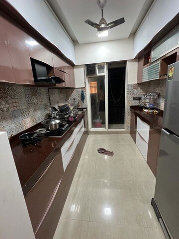 Kitchen in 2 BHK Apartment at Rosa Gardenia, Ghodbunder Road – for Rent
