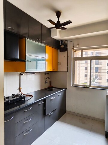 Kitchen in 1 BHK Apartment at Puranik City, Kasarvadavali – for Rent