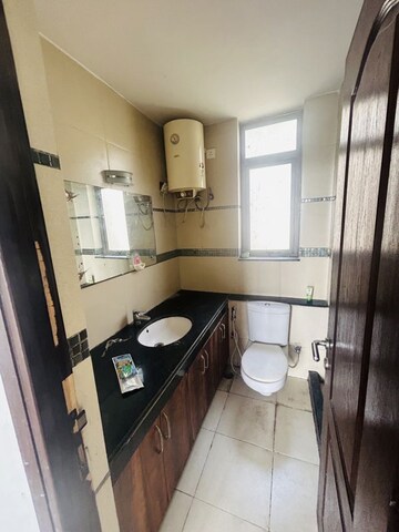Bathroom in 2 BHK Apartment at Unitech Uniworld Gardens 2, Sector 47 – for Rent