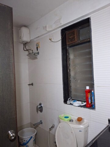 Bathroom in 2 BHK Apartment at Neptune Living Point, Bhandup West – for Sale