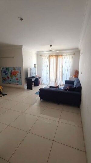 Living Room in 2 BHK Apartment at Puravankara Palm Beach, Hennur – for Rent