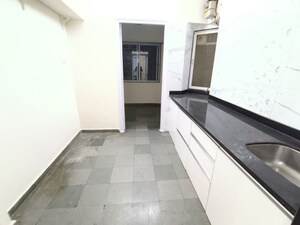 Kitchen in 1.5 BHK Apartment at Thane West – for Rent