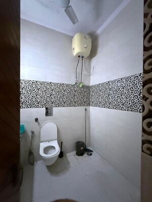 Bathroom in 3 BHK Builder Floor at Kalkaji – for Rent