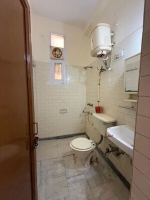 Bathroom in 3 BHK Builder Floor at Kalkaji – for Rent